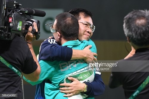 Hoang Xuan Vinh, ganador de la primera medalla olímpica de oro en la historia de Vietnam - ảnh 9