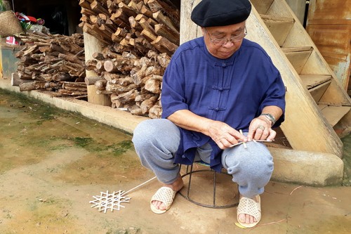 La importancia del amuleto “Ta dieu” en la vida espiritual de la etnia Thai - ảnh 1