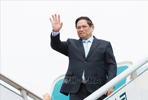 Premier vietnamita concluye con éxito su viaje de trabajo a China - ảnh 1