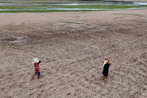 Près de 900 millions de pauvres menacées par le changement climatique - ảnh 1