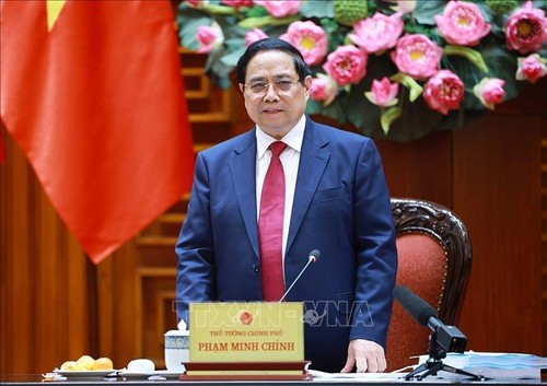 Pham Minh Chinh: Assurer le progrès, la justice sociale et un accès équitable à l’inclusion financière - ảnh 2