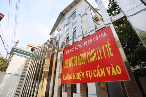 Self-quarantine allowed for fully vaccinated people in close contact with COVID-19 patient  - ảnh 1