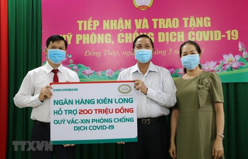 Quỹ vaccine phòng COVID-19 nhận được 5.777 tỷ đồng - ảnh 1