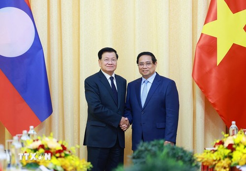 Thủ tướng Phạm Minh Chính hội kiến Tổng Bí thư Lào Thongloun Sisoulith - ảnh 1