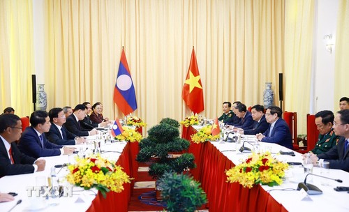 Thủ tướng Phạm Minh Chính hội kiến Tổng Bí thư Lào Thongloun Sisoulith - ảnh 2