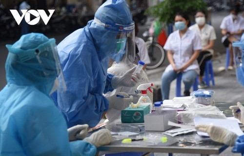 Vietnam logs additional 69,128 COVID-19 cases Thursday - ảnh 1