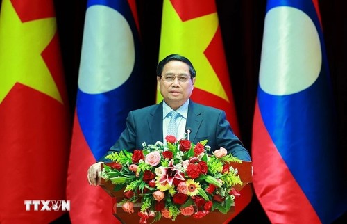 Vietnam, Laos Prime Ministers co-chair 2025 Investment Cooperation Conference - ảnh 2