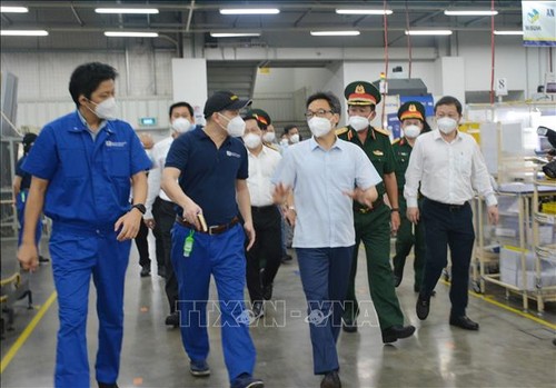 Vicepremier verifica actividades de producción y negocios en Ciudad Ho Chi Minh - ảnh 1