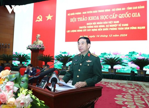 Sesiona simposio con motivo de 80 años de la fundación del Ejército Popular de Vietnam  - ảnh 2