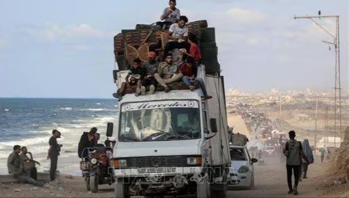 อิสราเอลยังคงโจมตีฉนวนกาซาถึงแม้ว่า การเจรจาหยุดยิงกำลังจะเริ่มขึ้น - ảnh 1