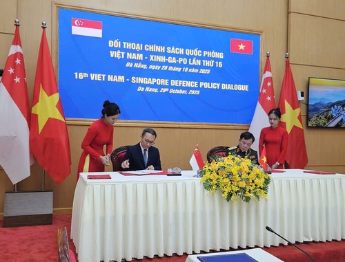 เวียดนาม-สิงคโปร์ลงนามข้อตกลงความร่วมมือด้านกลาโหม ช่วงปี 2025-2028 - ảnh 1