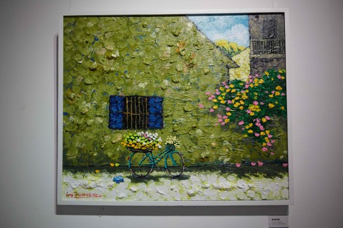 Blumenstraßen Hanois in Gemälde von Nguyen Hoang Long - ảnh 1