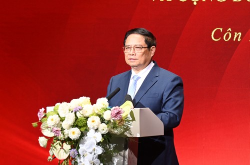 Premierminister Pham Minh Chinh trifft Vertreter vietnamesischer Community in China - ảnh 1