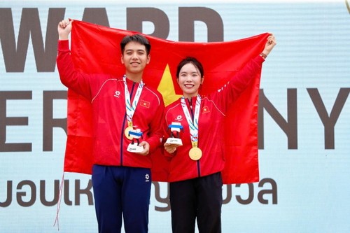 Vietnam secures more golds at SEA Games 33 - ảnh 1