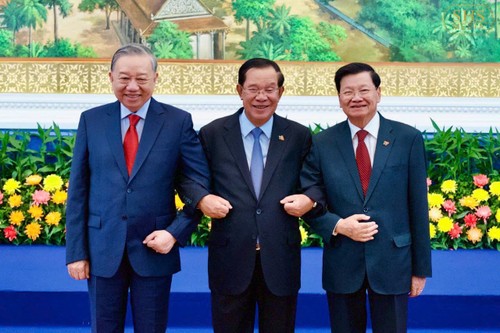 General Secretary To Lam co-chairs meeting of three Party leaders of Vietnam, Cambodia and Laos - ảnh 1