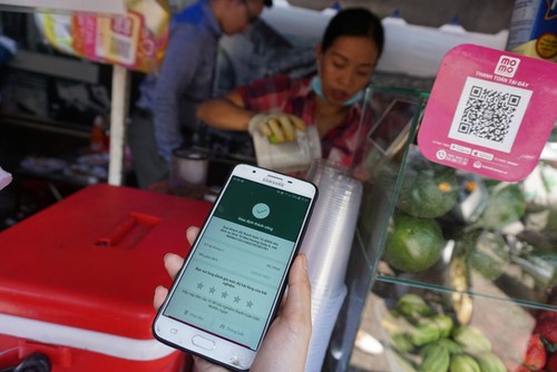 Bargeldlose Zahlung braucht umfassende und sichere Finanzdienstleistungen - ảnh 1