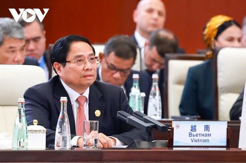 Le Vietnam plaide pour un renforcement de la coopération entre l’OCS et l’ASEAN - ảnh 1