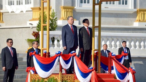 Tô Lâm reçu en grande pompe à Vientiane  - ảnh 1