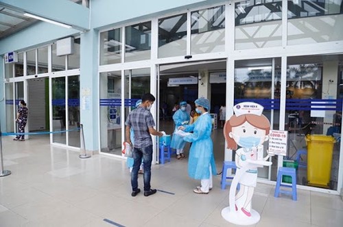 Les habitants de Hô Chi Minh-ville participent à la lutte anti-Covid-19 avec les autorités - ảnh 1