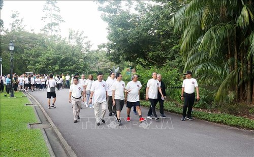 การพบปะสังสรรค์ระหว่างสถานทูตและสำนักงานตัวแทนการทูตของประเทศสมาชิกอาเซียนประจำสิงคโปร์ - ảnh 1