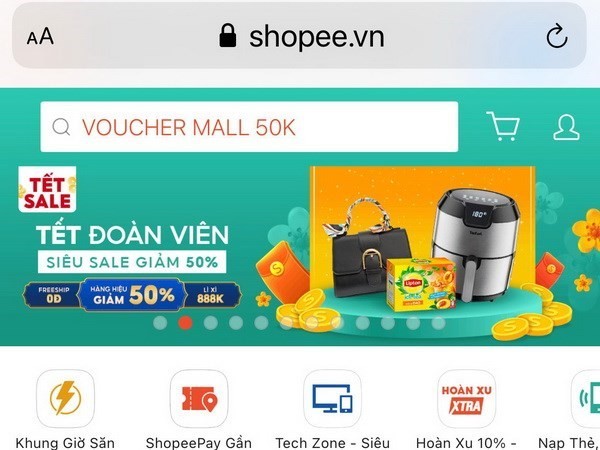 Bolsas electrónicas bulliciosas en vísperas del Tet tradicional de Vietnam - ảnh 1