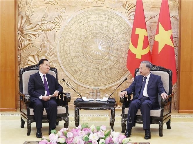 Secretario general del PCV recibe a jefe de la Oficina Central del PPRL - ảnh 2