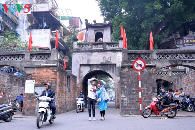 Ambiente del Tet vietnamita en ojos de jóvenes foráneos - ảnh 11