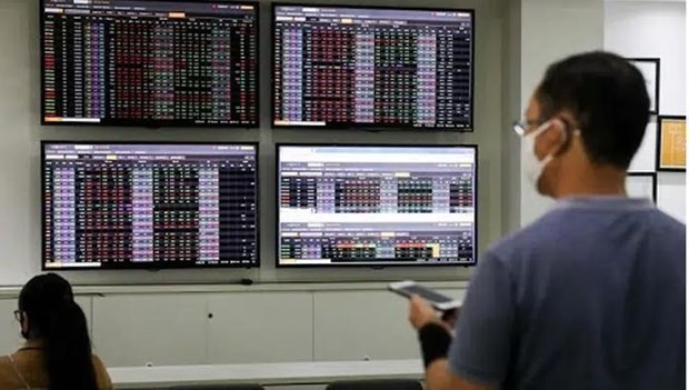 Publican informe sobre el mercado financiero de Vietnam en 2021 y 2022 - ảnh 1