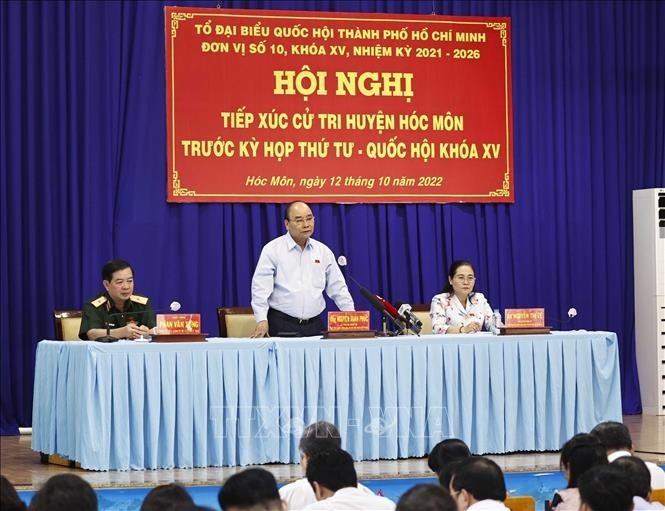 Presidente Nguyen Xuan Phuc se reúne con votantes de Ciudad Ho Chi Minh - ảnh 1