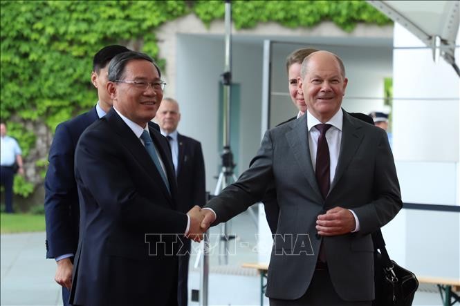 Olaf Scholz se encuentra con su homólogo chino Li Qiang - ảnh 1