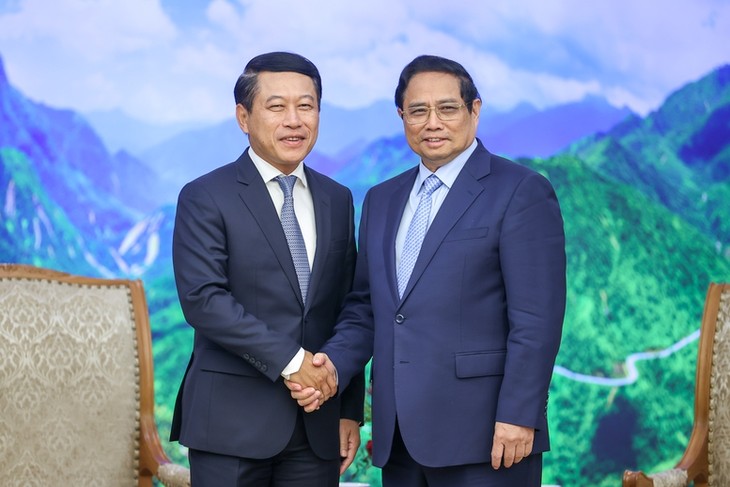 Primer ministro de Vietnam recibe a viceprimer ministro de Laos - ảnh 1