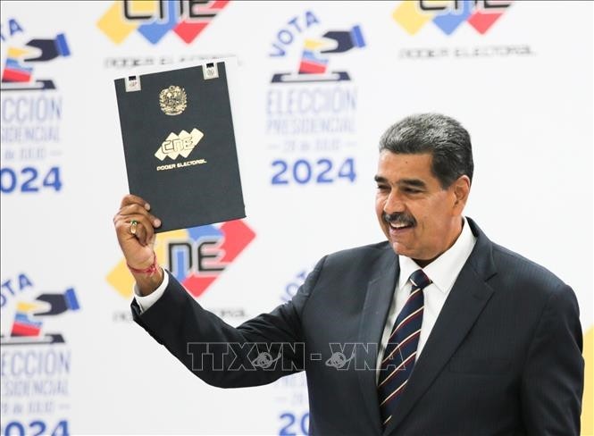 Consejo Nacional Electoral de Venezuela confirma que el presidente Maduro gana las elecciones - ảnh 1