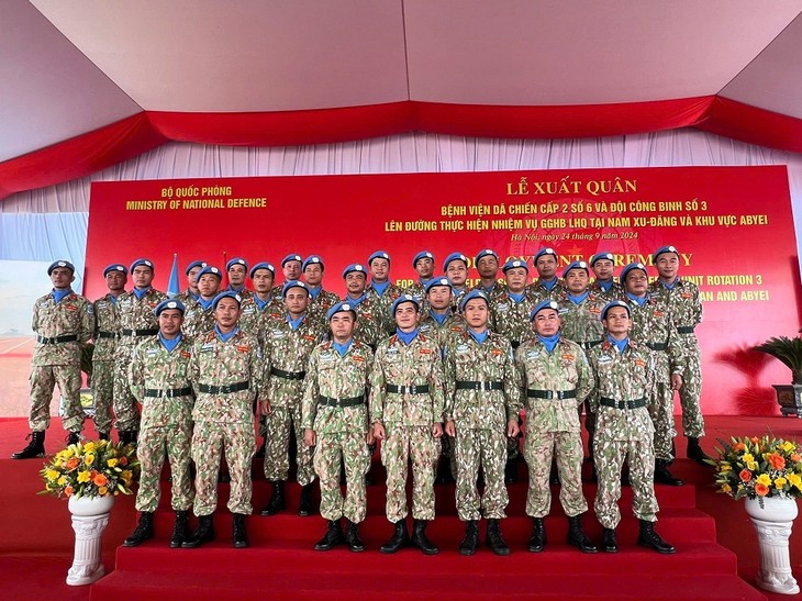 Ceremonia de abanderamiento de unidades vietnamitas participantes en misiones de mantenimiento de paz de la ONU - ảnh 1