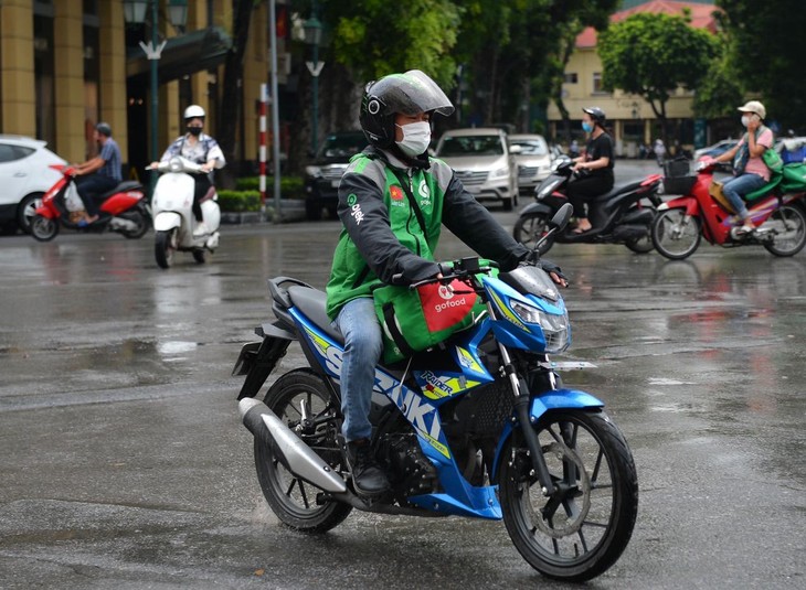 Gojek Vietnam dan Misi Mendukung Mitra Pengemudi untuk Berkembang secara Berkelanjutan - ảnh 1