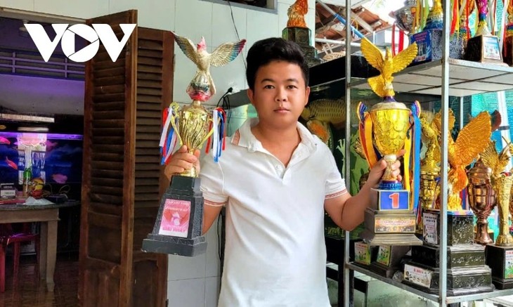 Tran Huu Vinh gründet seine Existenz mit der Zucht von Ziervögeln - ảnh 2