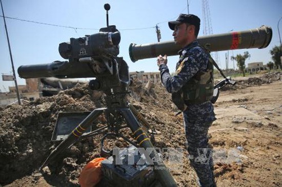 Tentara Irak membebaskan lagi banyak daerah di sebelah Barat, kota Mosul - ảnh 1