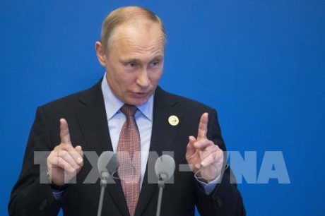 Presiden Rusia, Vladimir Putin membantah bahwa Rusia menerima informasi rahasia dari Presiden AS, Donald Trump - ảnh 1