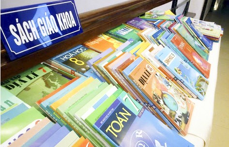 Memperhebat pelaksanaan pembaruan program dan buku-buku ajar untuk pendidikan menengah - ảnh 1