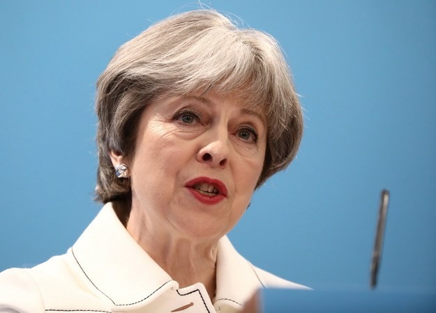 Masalah Brexit: PM Inggris pada permulaannya telah melampaui kesulitan internal - ảnh 1