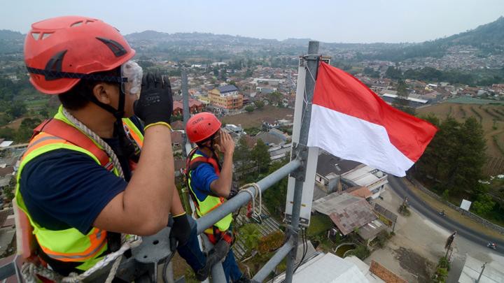 Berbagai cara pengibaran bendera sambut HUT Hari Kemerdekaan RI ke-74   - ảnh 7