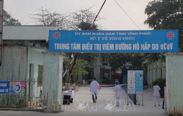 Keenambelas pasien yang terinfeksi Covid-19 di Vietnam keluar dari rumah sakit - ảnh 1