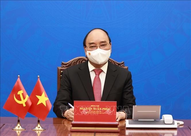 Presiden Vietnam Nguyen Xuan Phuc Lakukan Pembicaraan Telepon dengan Sekjen, Presiden Tiongkok, Xi Jinping - ảnh 1