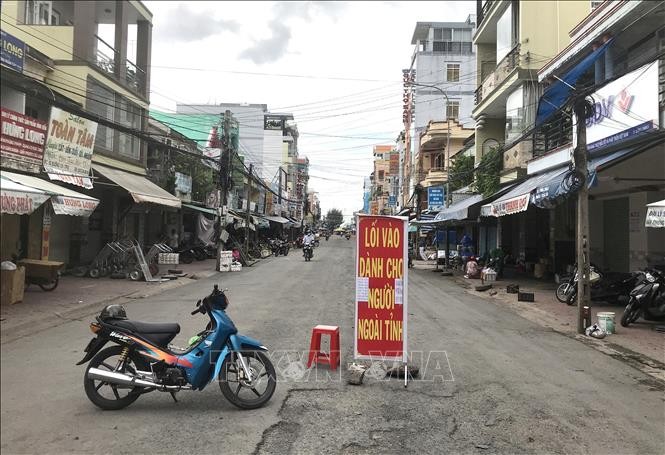 Provinsi Vinh Long dan Tien Giang perlu Laksanakan Serius Pencegahan dan Penanggulangan Wabah Covid-19 - ảnh 1