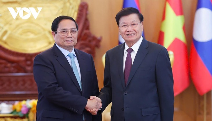 PM Pham Minh Chinh Beraudiensi dengan Sekjen, Presiden Laos, Thongloun Sisoulith - ảnh 1