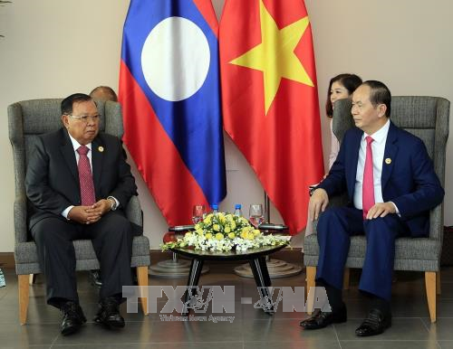 Tran Dai Quang rencontre Bounnhang Vorachith, Hun Sen et Moon Jae-in - ảnh 1