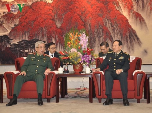 Deputy Defence Minister visits China to boost military exchanges - ảnh 1