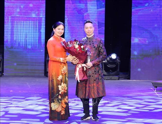 Vietnam Ao Dai Week begins prior to International Women's Day - ảnh 1