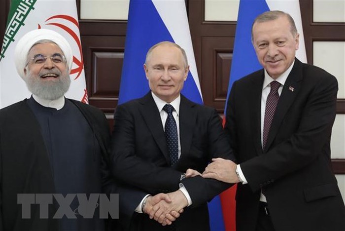 Presiden Rusia bersama dengan Turki dan Iran ingin menyusun rencana aksi bersama di Suriah - ảnh 1