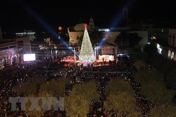 Pilgrims flock to Jesus’s birth place to celebrate Christmas - ảnh 1