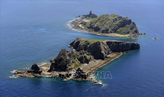 Kapal Kepolisian Tiongkok mengejar kapal penangkap ikan Jepang di dekat kepulauan sengketa  - ảnh 1